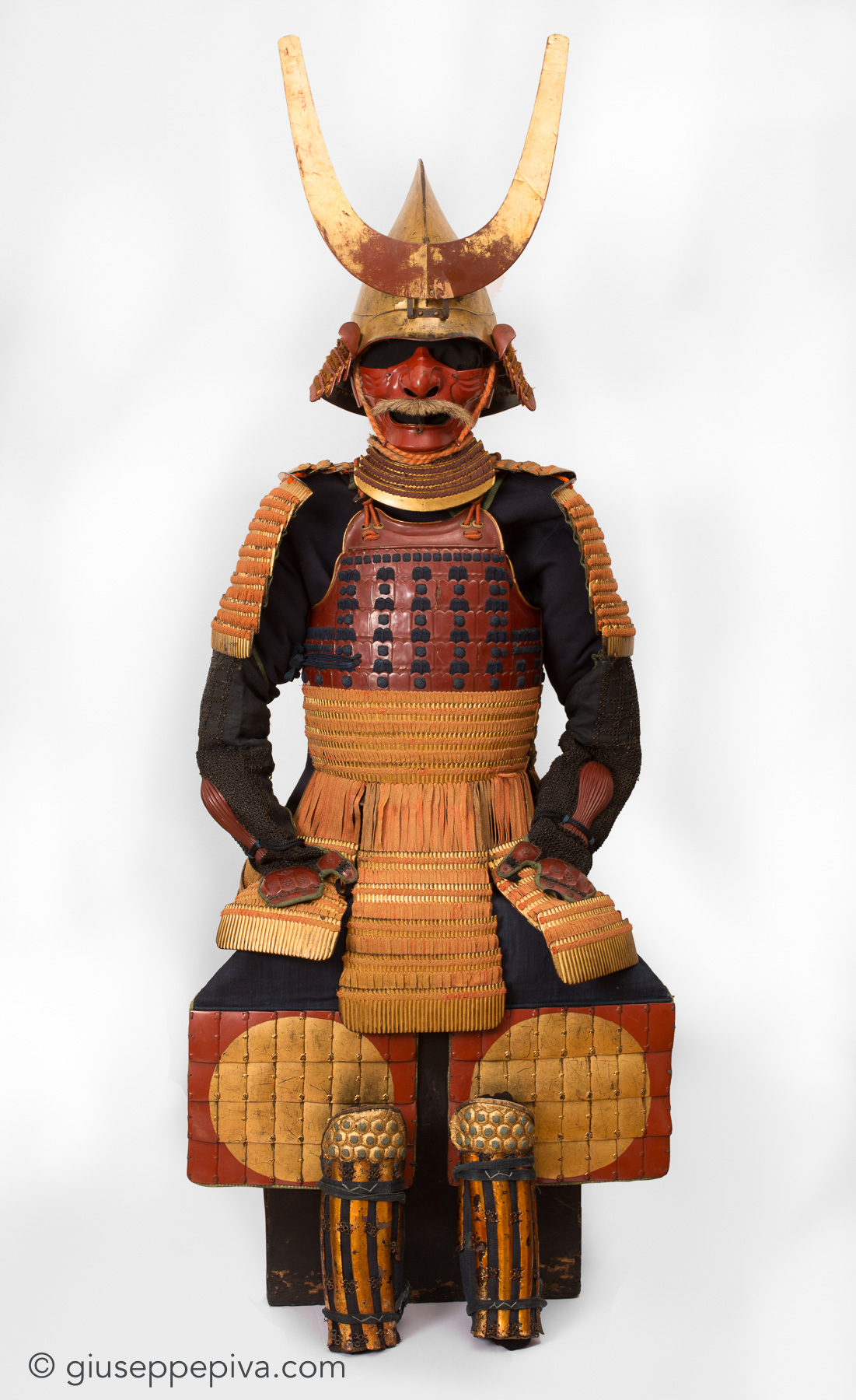 Red and gold lacquer Japanese samurai armor, 17th Century